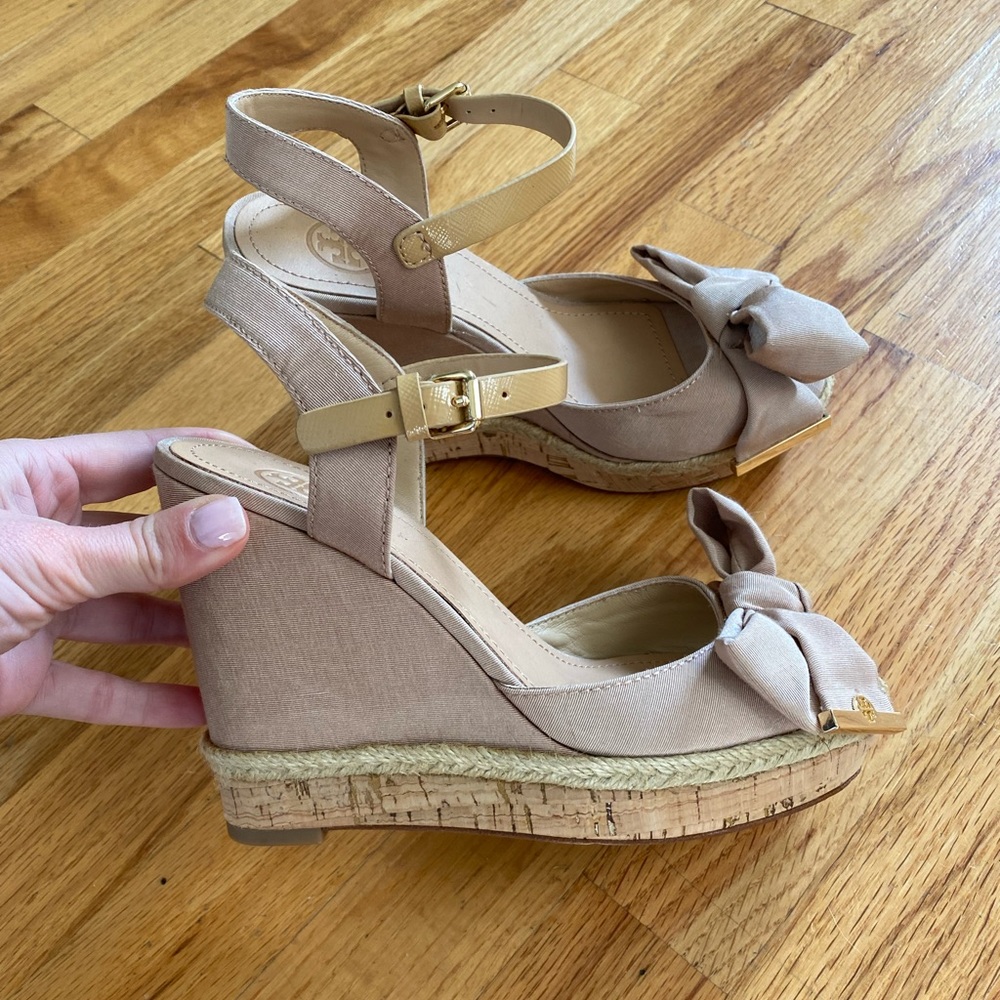 Tory Burch— never worn wedge sandals. Size 6.5. True to size.